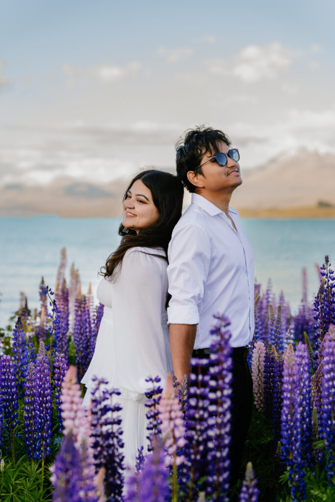 Lake Tekapo, New Zealand couple photoshoot amongst the lupins