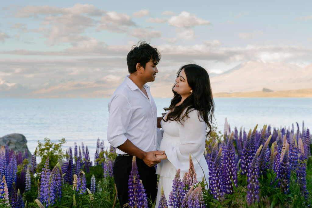 Discover everything you need to know for a Lake Tekapo couples photoshoot — from the best lupin fields to romantic location ideas and timing.